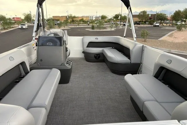 Slide: The Image of 2026 Sun Tracker Party Barge 16 DLX interior with spacious seating and modern design. - 2