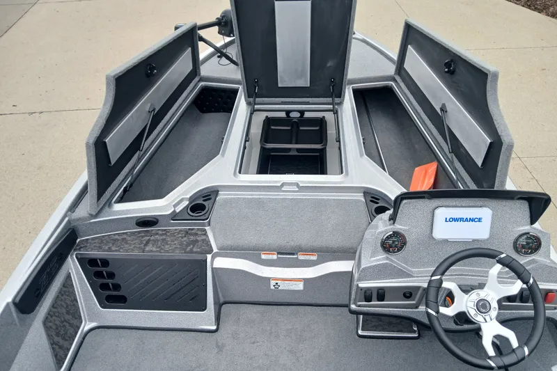 Slide: The Image of 2026 Nitro Z19 XL boat interior with storage compartments and Lowrance dashboard. - 5