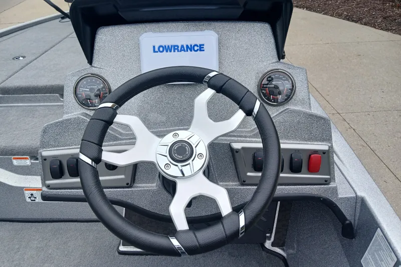 Slide: The Image of Steering console of 2026 Nitro Z19 XL boat with Lowrance display and gauges. - 3