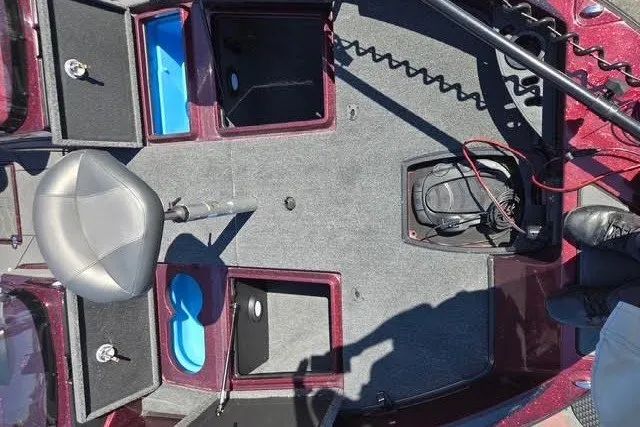 Slide: The Image of Interior view of a 2026 Nitro ZV20 boat, featuring seating and storage compartments. - 7