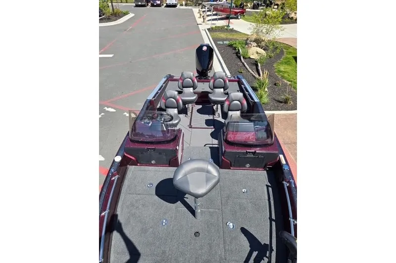 Slide: The Image of 2026 Nitro ZV20 boat with seating, parked on a paved area. - 4
