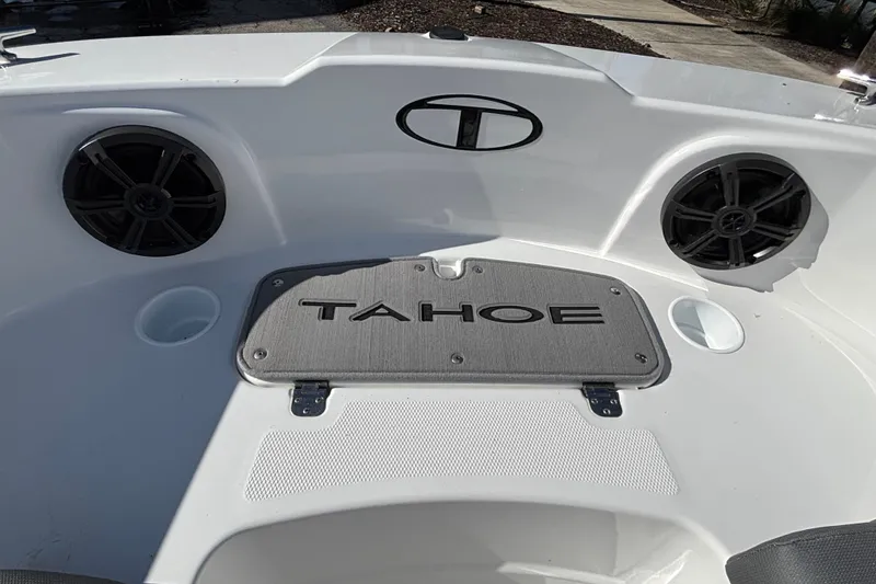 Slide: The Image of 2026 Tahoe T21 boat interior with speakers and branded storage compartment. - 10