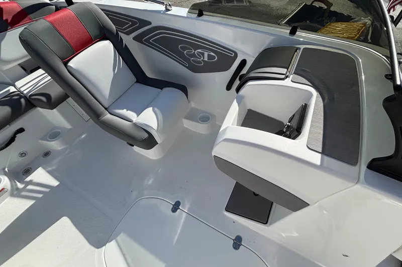 Slide: The Image of Interior of 2026 Tahoe T21 boat with modern seating and sleek design. - 12