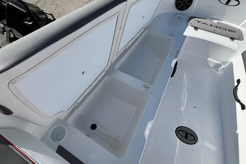 Slide: The Image of Interior view of 2026 Tahoe T21 boat with storage compartments and seating. - 6