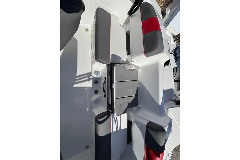 Slide: The Image of 2026 Tahoe T21 boat interior with gray and red seating, showcasing modern design. - 15