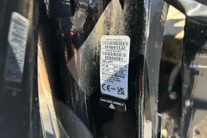 Slide: The Image of Label on 2026 Tracker Grizzly 1654 T Sportsman, displaying model and serial numbers. - 49