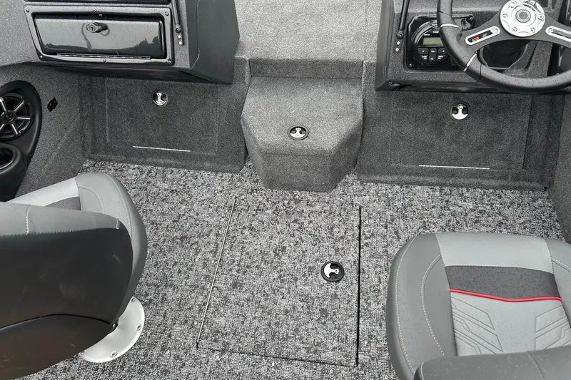 Slide: The Image of Interior of 2026 Tracker Targa V-19 Combo boat with gray carpet and seating. - 5