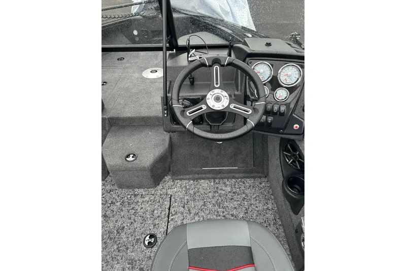 Slide: The Image of 2026 Tracker Targa V-19 Combo boat cockpit with steering wheel and instrument panel. - 4