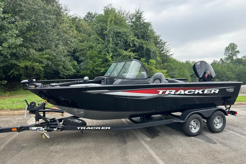 The Image of 2026 Tracker Targa V-19 Combo boat on trailer, parked outdoors. - 0