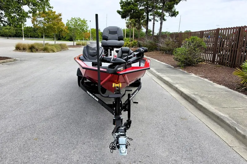 Slide: The Image of 2026 Tracker Pro Team 190 boat on trailer in parking lot. - 7