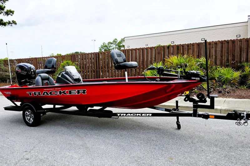 Slide: The Image of 2026 Tracker Pro Team 190 fishing boat in vibrant red on a trailer. - 4