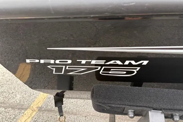 Slide: The Image of 2026 Tracker Pro Team 175 Crappie Edition boat, black exterior with white lettering. - 13