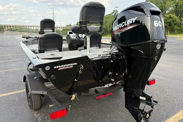 Slide: The Image of 2026 Tracker Pro Team 175 Crappie Edition boat with Mercury 60 engine in parking lot. - 5