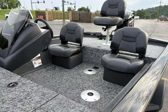 Slide: The Image of 2026 Tracker Pro Team 175 Crappie Edition boat interior with seating and steering console. - 19