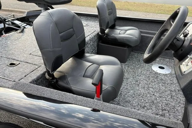 Slide: The Image of 2026 Tracker Pro Team 175 Crappie Edition boat interior with two gray seats. - 25