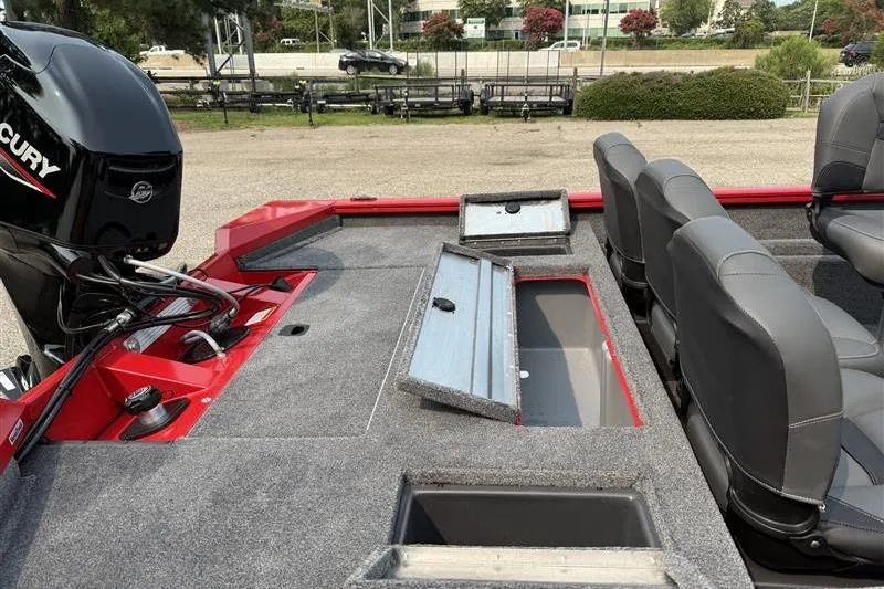 Slide: The Image of 2026 Tracker Pro Team 175 Crappie Edition boat interior with storage compartments and seating. - 14