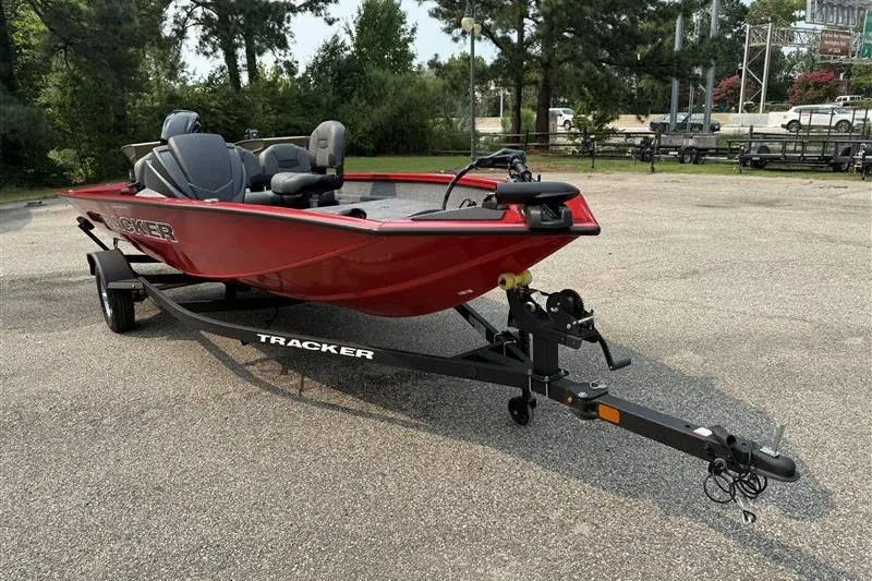 Slide: The Image of 2026 Tracker Pro Team 175 Crappie Edition boat in a parking lot. - 4