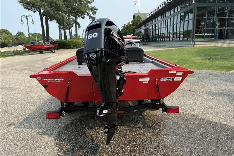 Slide: The Image of 2026 Tracker Pro Team 175 Crappie Edition boat with Mercury 50 engine, parked outdoors. - 3