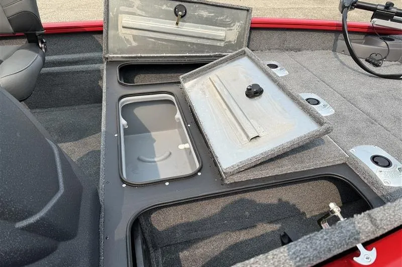 Slide: The Image of 2026 Tracker Pro Team 175 Crappie Edition boat storage compartments open, showcasing interior design. - 12