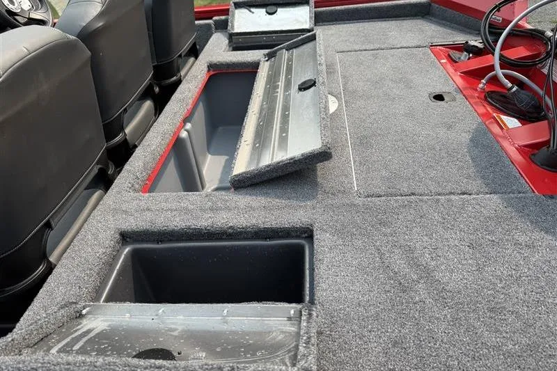 Slide: The Image of 2026 Tracker Pro Team 175 Crappie Edition boat interior with open storage compartments. - 15