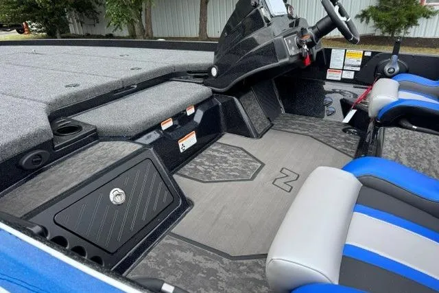 Slide: The Image of 2026 Nitro Z21 XL boat interior with modern seating and sleek dashboard design. - 7