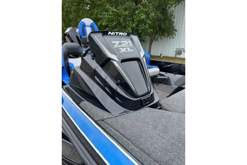 Slide: The Image of 2026 Nitro Z21 XL boat with sleek design and blue accents. - 10