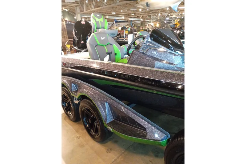 Slide: The Image of 2026 Ranger Z519R Cup-Equipped boat with sleek design and vibrant green accents. - 1