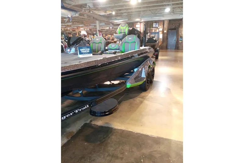 The Image of 2026 Ranger Z519R Cup-Equipped boat displayed indoors with competitive financing sign. - 0