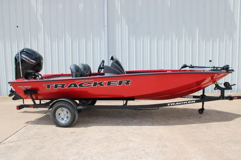The Image of 2026 Tracker Pro Team 175 Crappie Edition boat, red, on trailer, side view. - 0