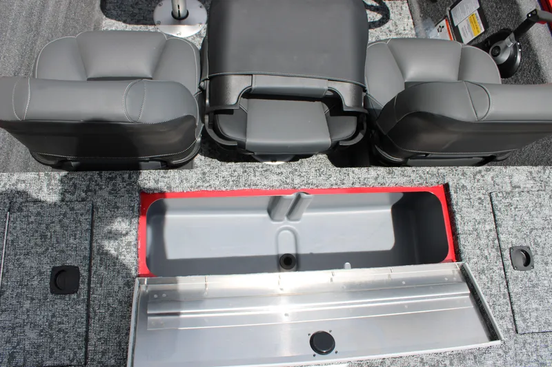 Slide: The Image of 2026 Tracker Pro Team 175 Crappie Edition boat interior with seating and storage compartment. - 12