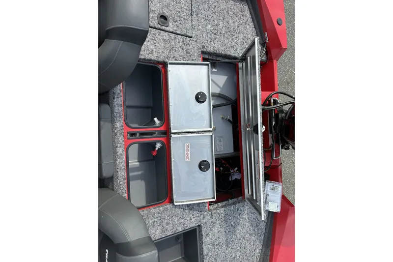 Slide: The Image of 2026 Tracker Pro Team 195 boat interior with open storage compartments. - 17