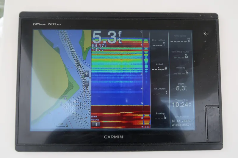 Slide: The Image of Garmin GPS display on 2017 Edgewater 245CC showing depth and navigation data. - 9