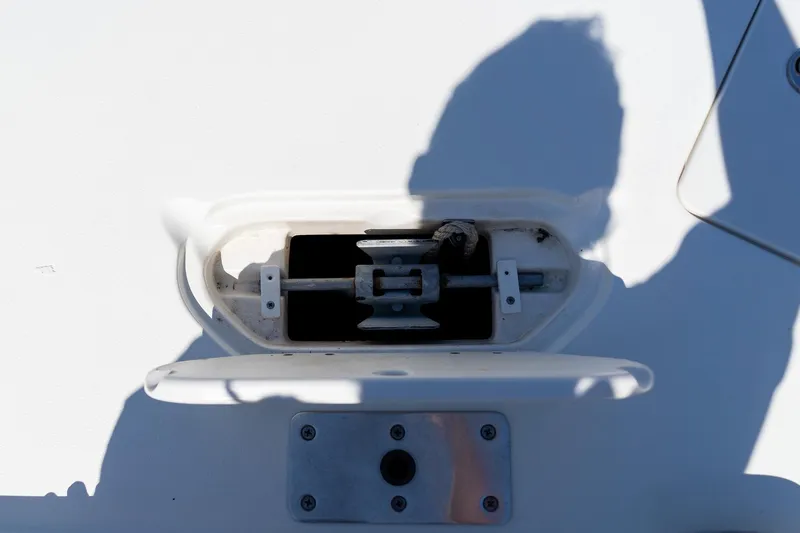 Slide: The Image of Hatch on 2020 NauticStar 203 SC boat with shadow cast on surface. - 12