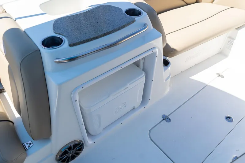 Slide: The Image of 2020 NauticStar 203 SC boat interior with seating and storage compartment. - 31