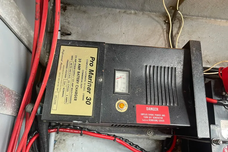 Slide: The Image of Pro Mariner 30 amp battery charger in 1992 Sea Ray 370 Express Cruiser. - 25