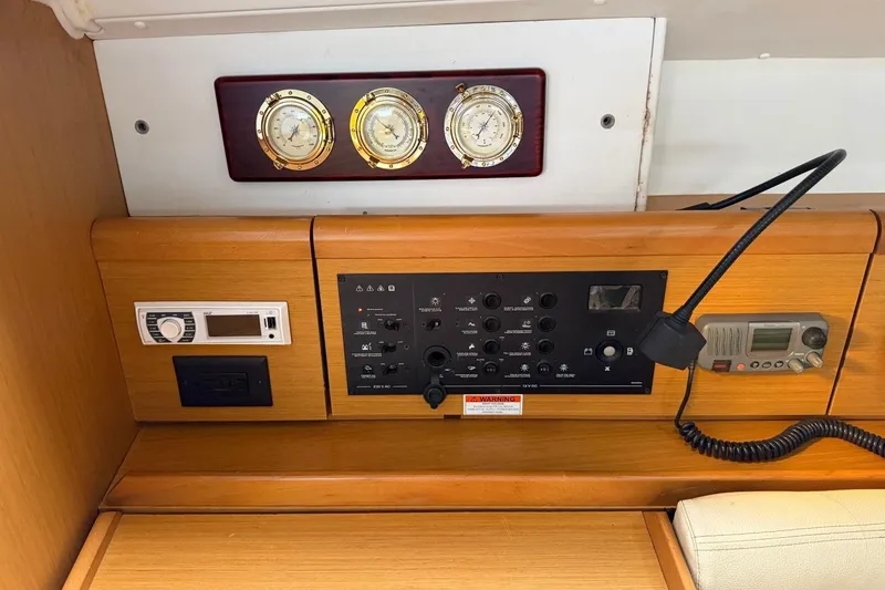 Slide: The Image of Control panel of a 2011 Jeanneau Sun Odyssey 36i sailboat with navigation instruments. - 17