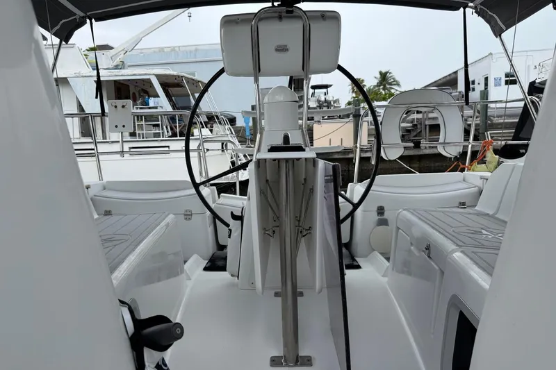 Slide: The Image of Cockpit of 2011 Jeanneau Sun Odyssey 36i sailboat with steering wheel and seating. - 25