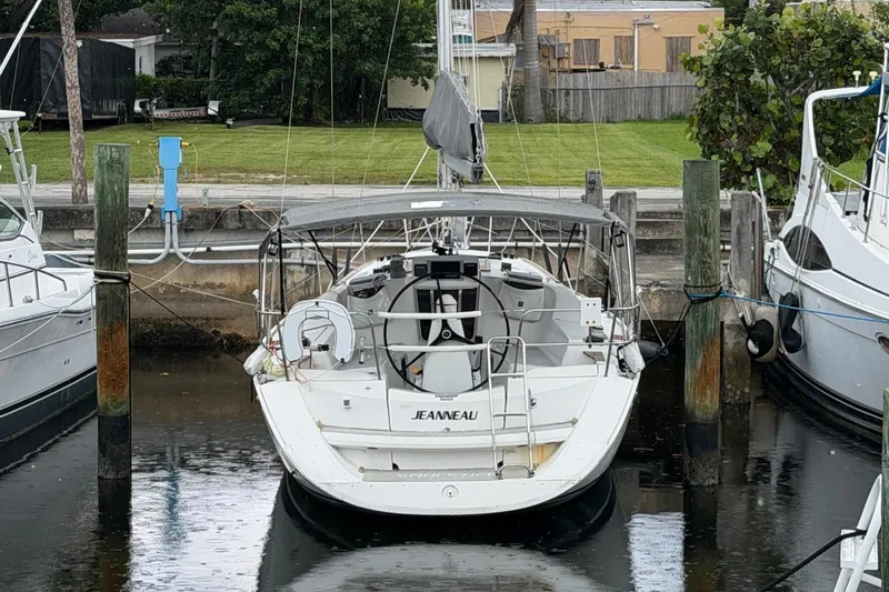 Slide: The Image of Jeanneau Sun Odyssey 36i sailboat docked in a marina, 2011 model. - 26