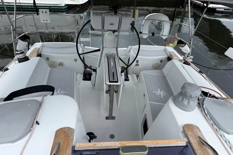 Slide: The Image of Cockpit of 2011 Jeanneau Sun Odyssey 36i sailboat with dual steering wheels. - 4