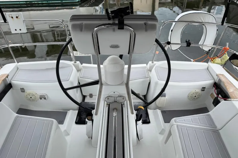 Slide: The Image of Cockpit of 2011 Jeanneau Sun Odyssey 36i sailboat with dual steering wheels. - 5