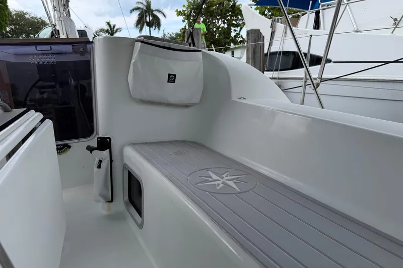 Slide: The Image of Cockpit of 2011 Jeanneau Sun Odyssey 36i sailboat with seating and storage. - 8
