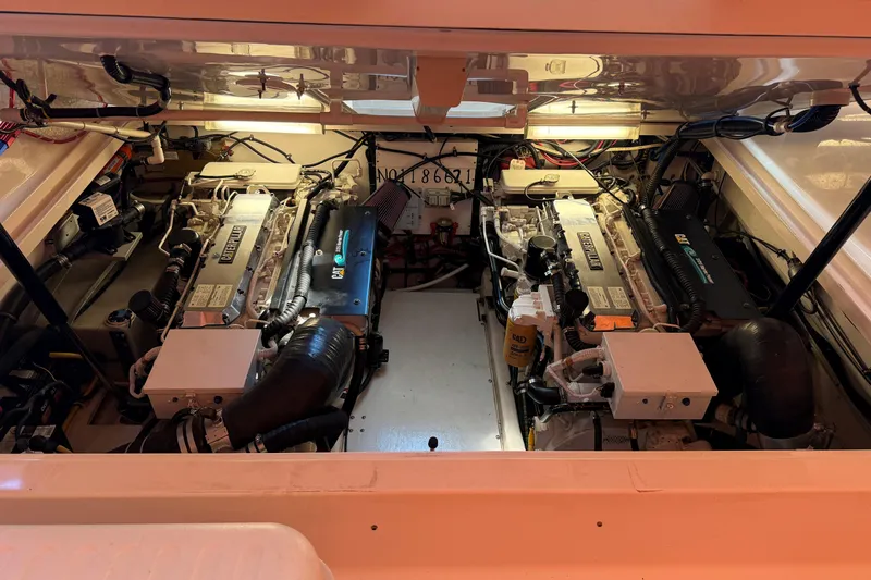 Slide: The Image of Engine room of a 2003 Tiara Yachts 3500 Open, showcasing dual Caterpillar engines. - 17