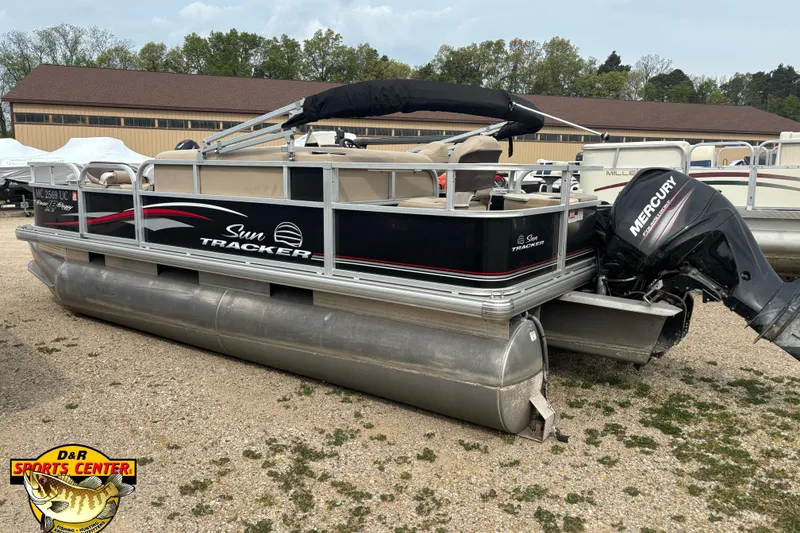 Slide: The Image of 2017 Sun Tracker Bass Buggy 18 DLX pontoon boat with Mercury outboard motor. - 2
