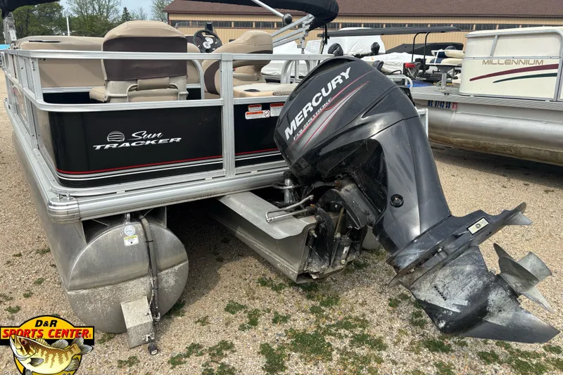 Slide: The Image of 2017 Sun Tracker Bass Buggy 18 DLX pontoon boat with Mercury outboard motor. - 4