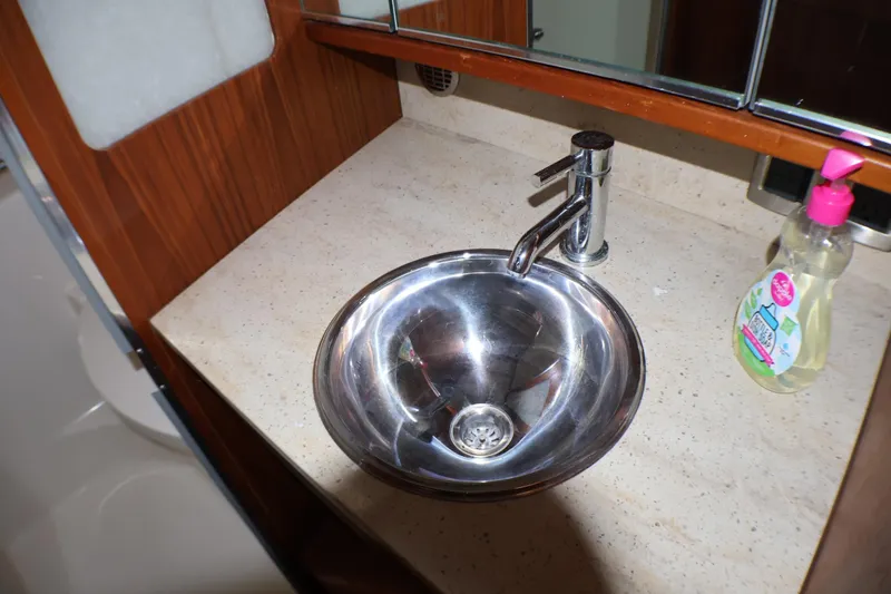 Slide: The Image of Stainless steel sink in 2009 Tiara Yachts 3500 Sovran bathroom with soap dispenser. - 19
