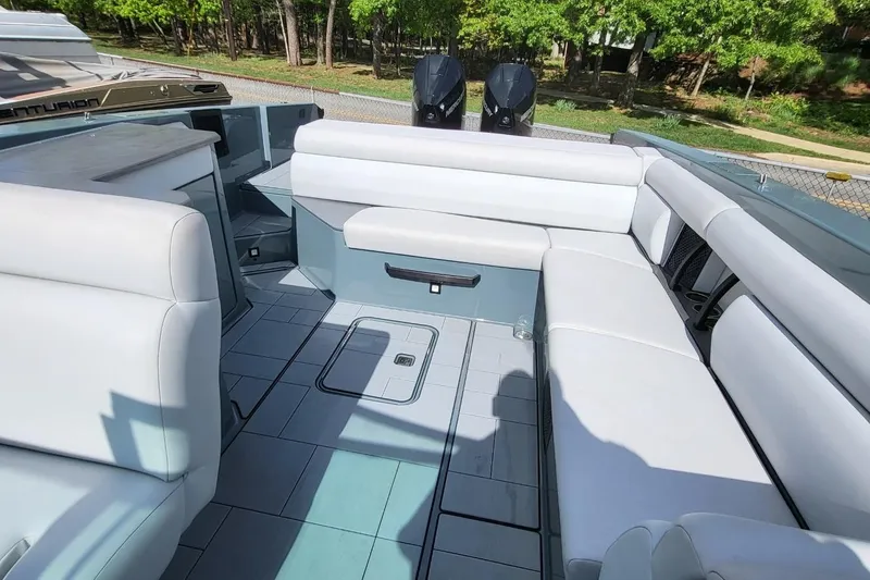 Slide: The Image of 2023 Aviara AV32 OB boat interior with spacious seating and modern design. - 11