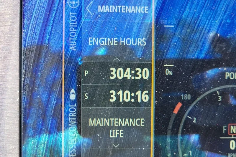 Slide: The Image of Display screen showing engine hours for Aviara AV32 OB, 2023 model. - 7