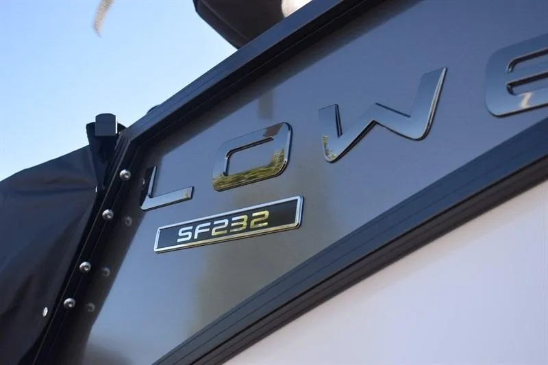 Slide: The Image of 2026 Lowe SF 232 WT Sport Fish boat logo close-up. - 12