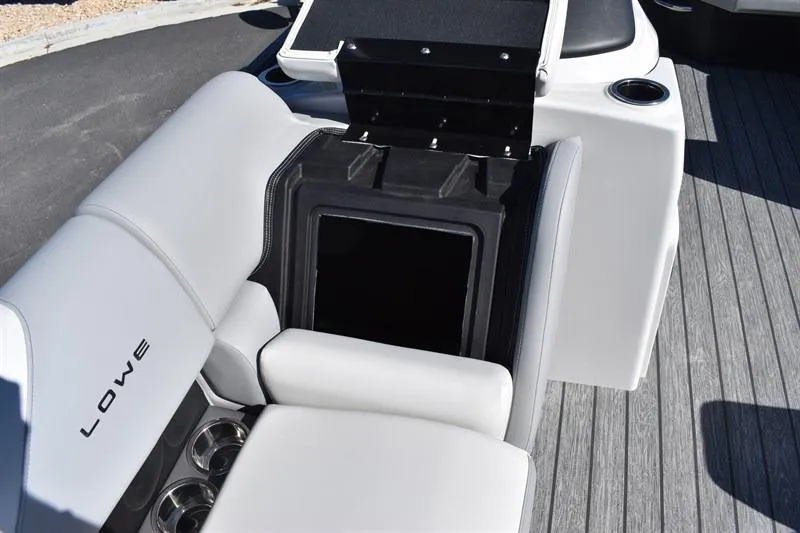 Slide: The Image of 2026 Lowe SF 232 WT Sport Fish boat interior with seating and storage compartment. - 16
