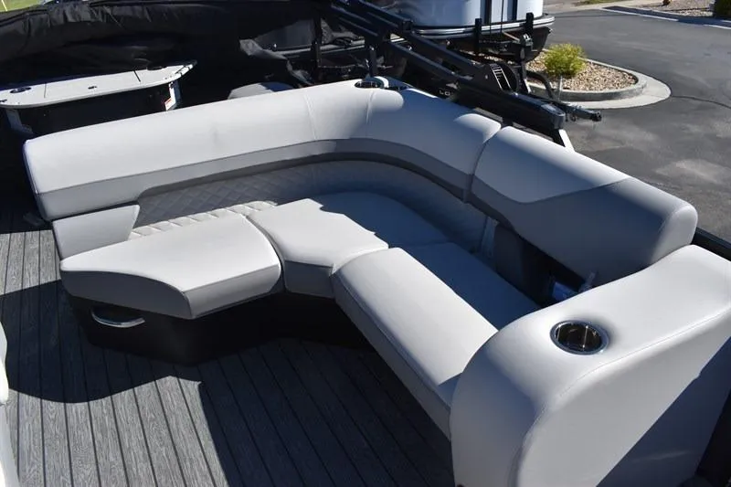 Slide: The Image of 2026 Lowe SF 232 WT Sport Fish boat with spacious, cushioned seating and cup holders. - 19